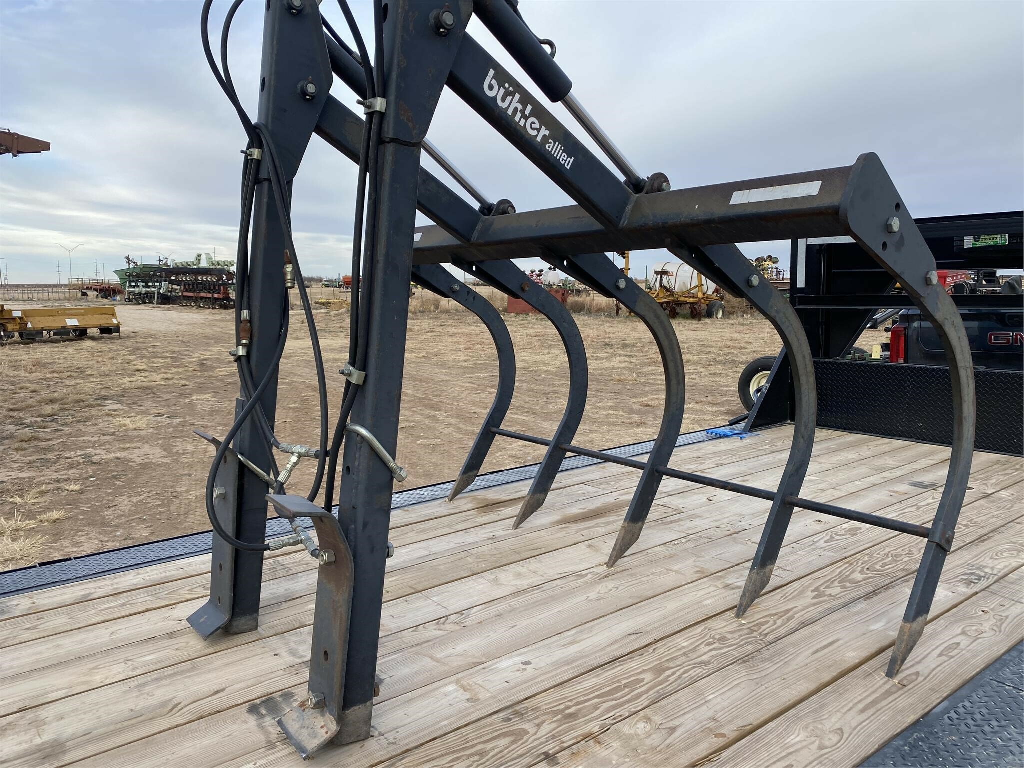 Buhler Allied Grapple Loader and Skid Steer Attachment Call