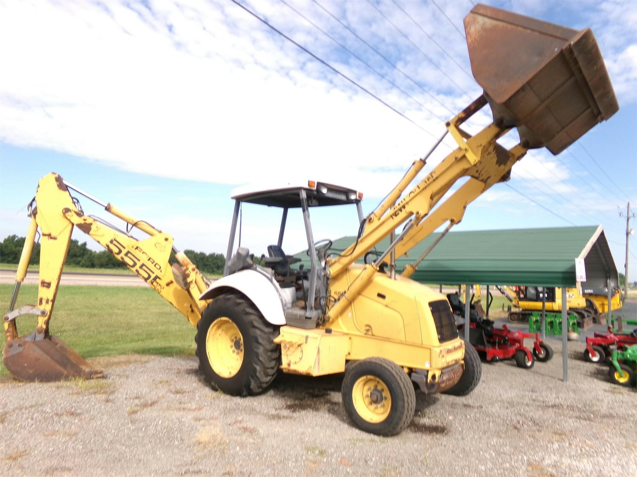 1998 New Holland 555E Backhoe 18,500 Machinery Pete