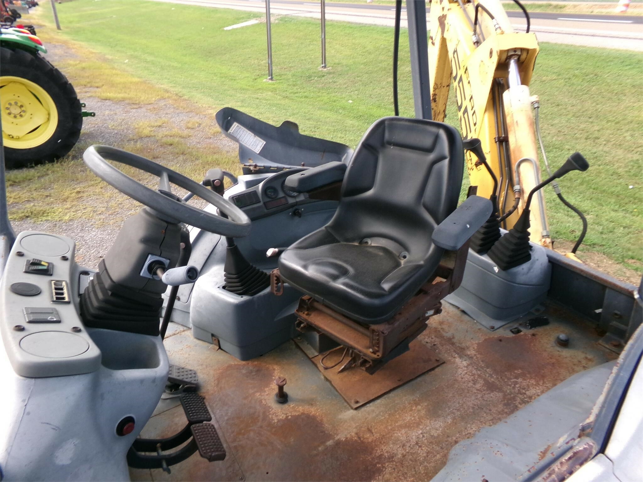 1998 New Holland 555E Backhoe 18,500 Machinery Pete