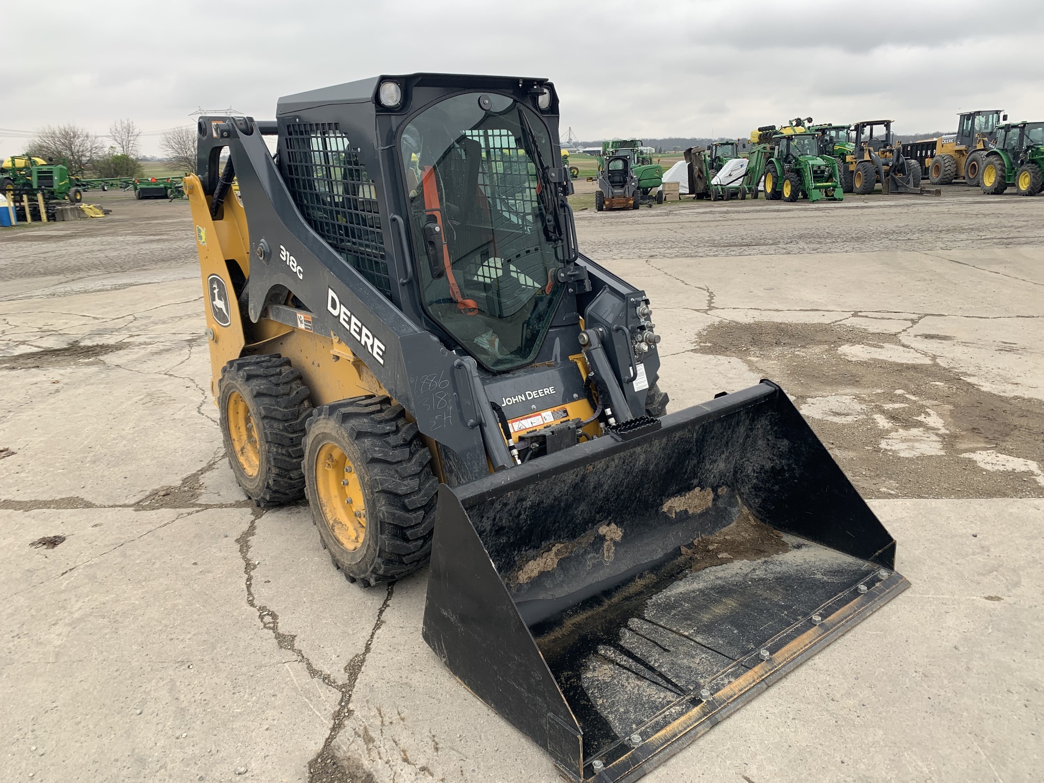 2023 Deere 318G Skid Steer