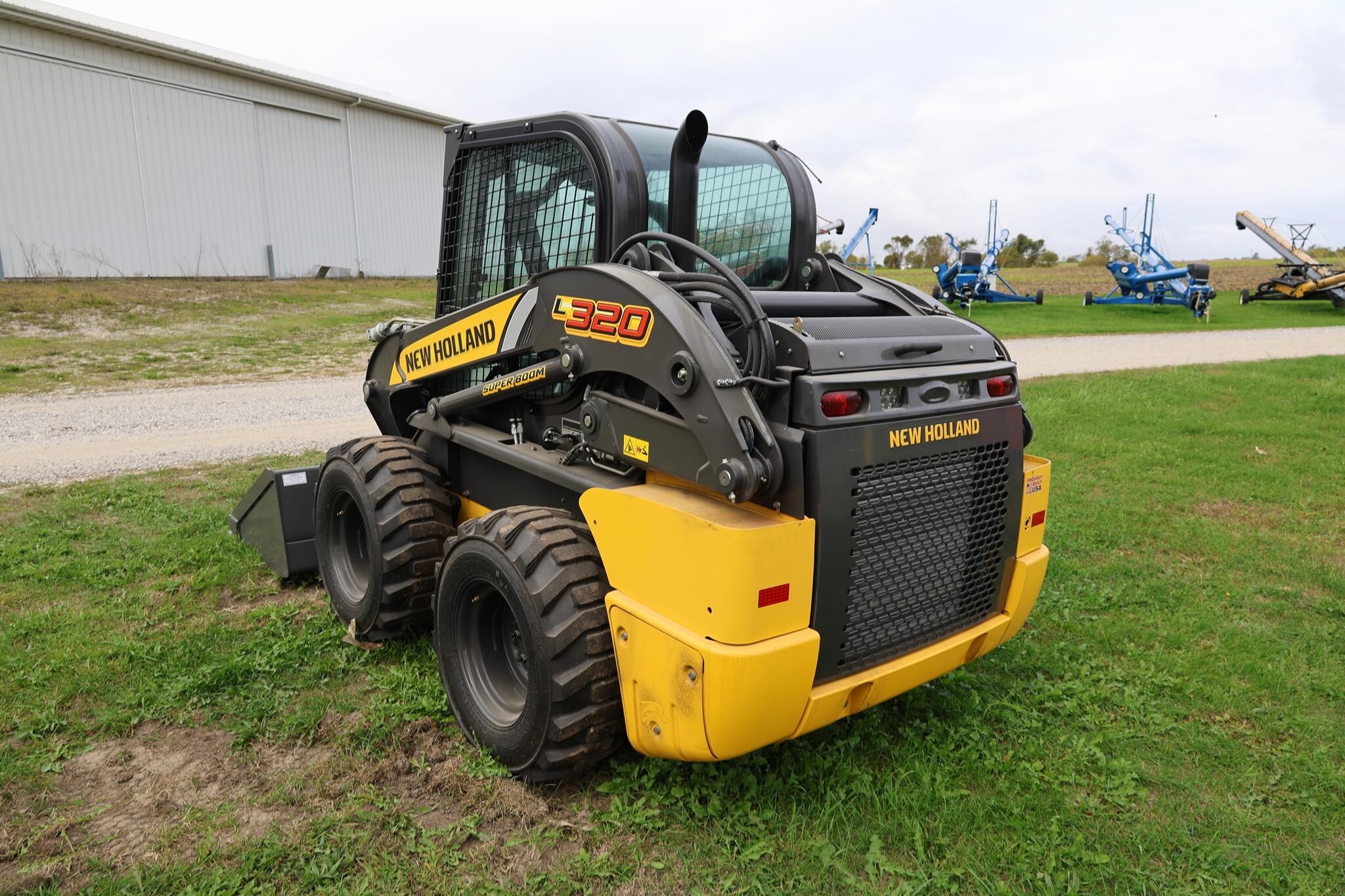 New Holland L320 Skid Steer