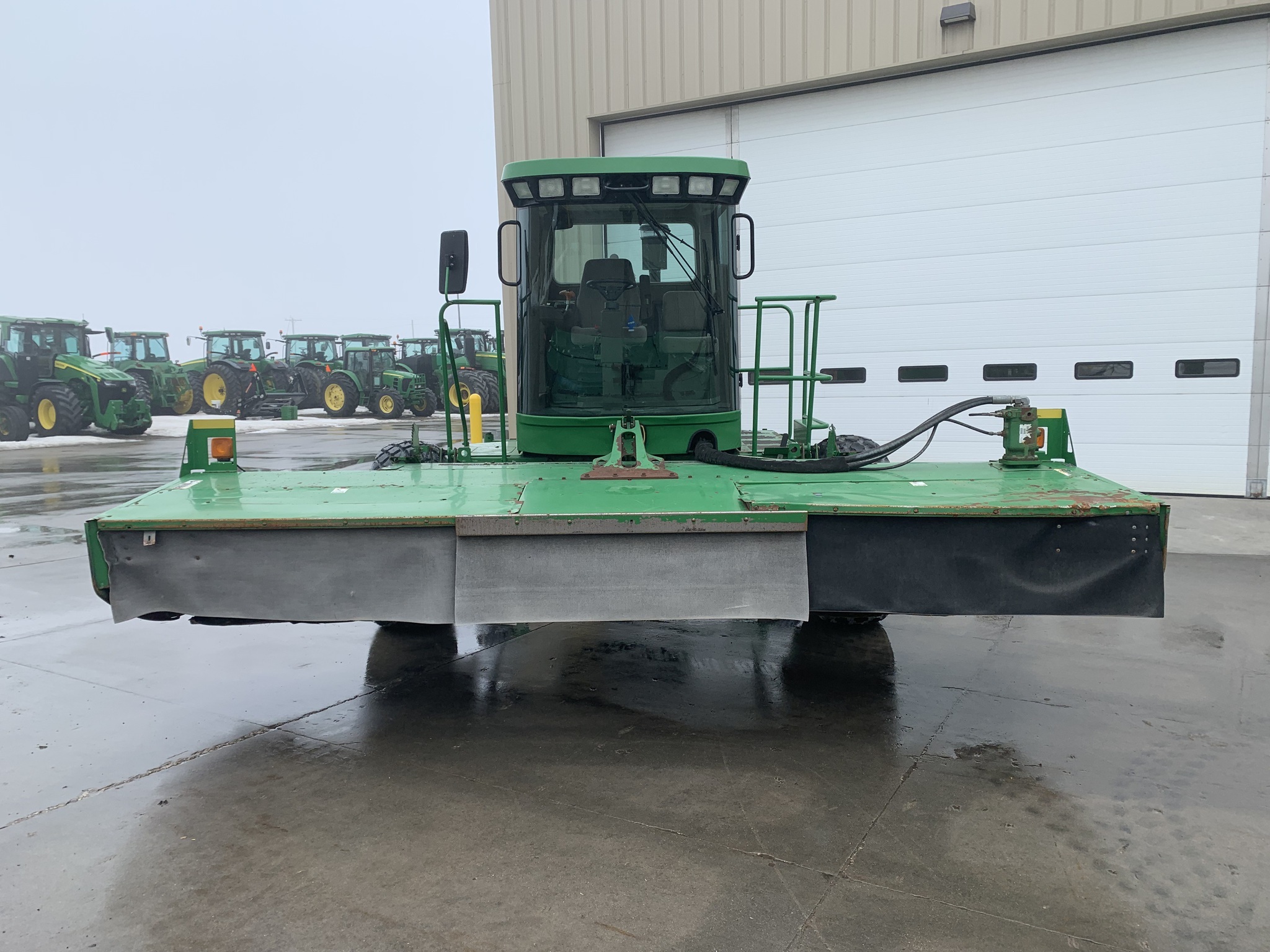 2005 John Deere 4995 Self-Propelled Windrowers and Swather