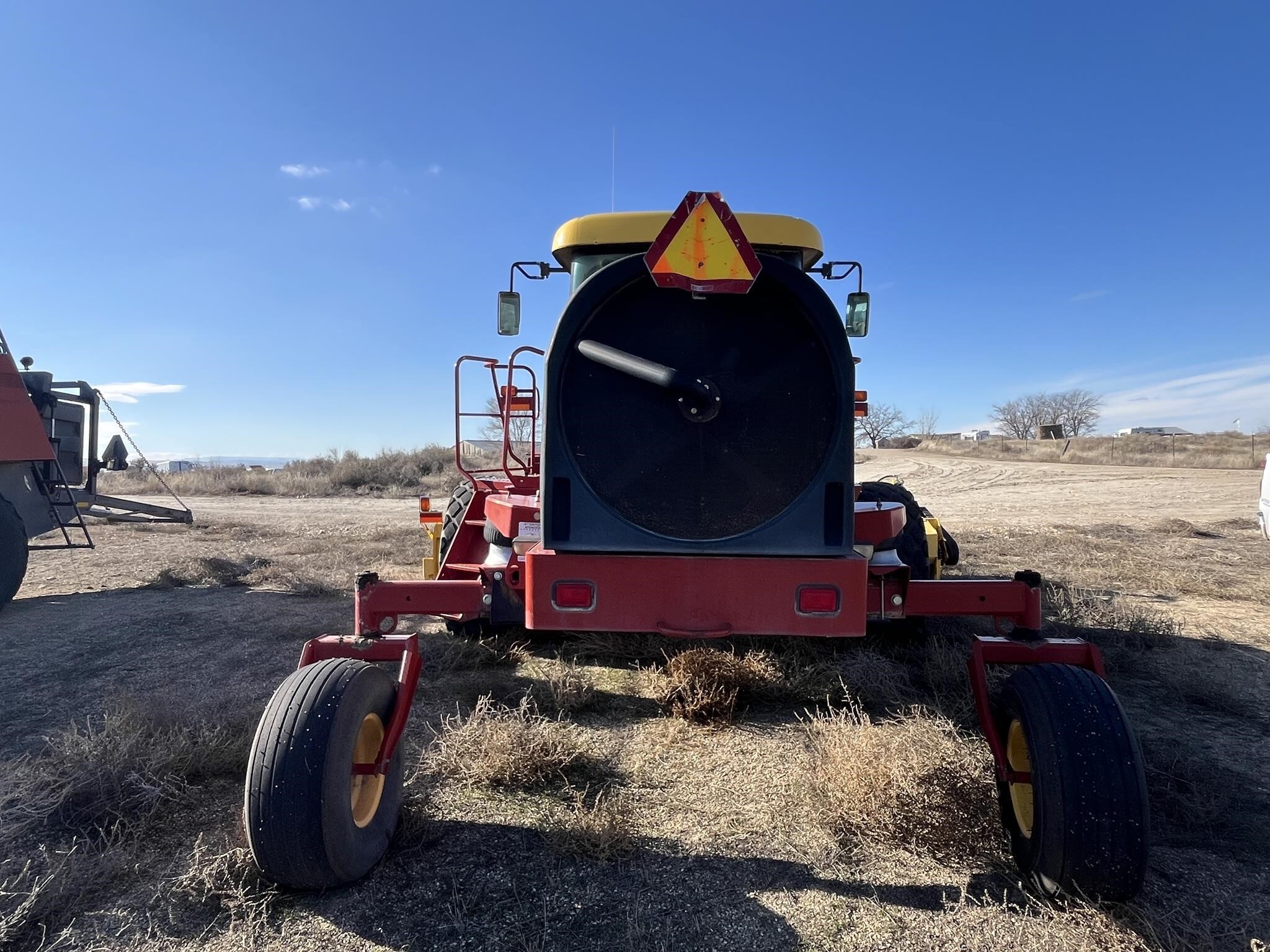 2009 New Holland H8060 Self-Propelled Windrowers and Swather