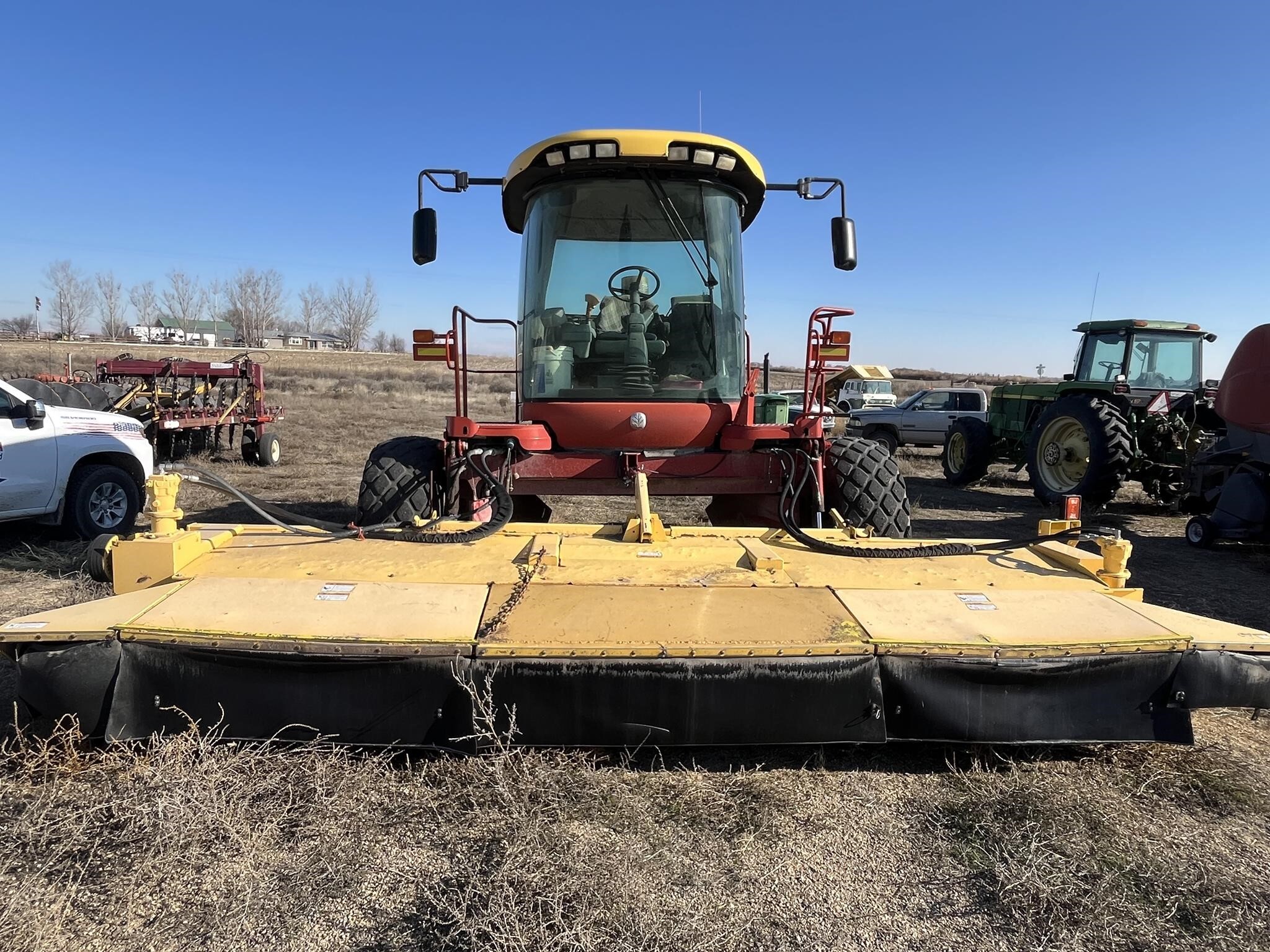 2009 New Holland H8060 Self-Propelled Windrowers and Swather