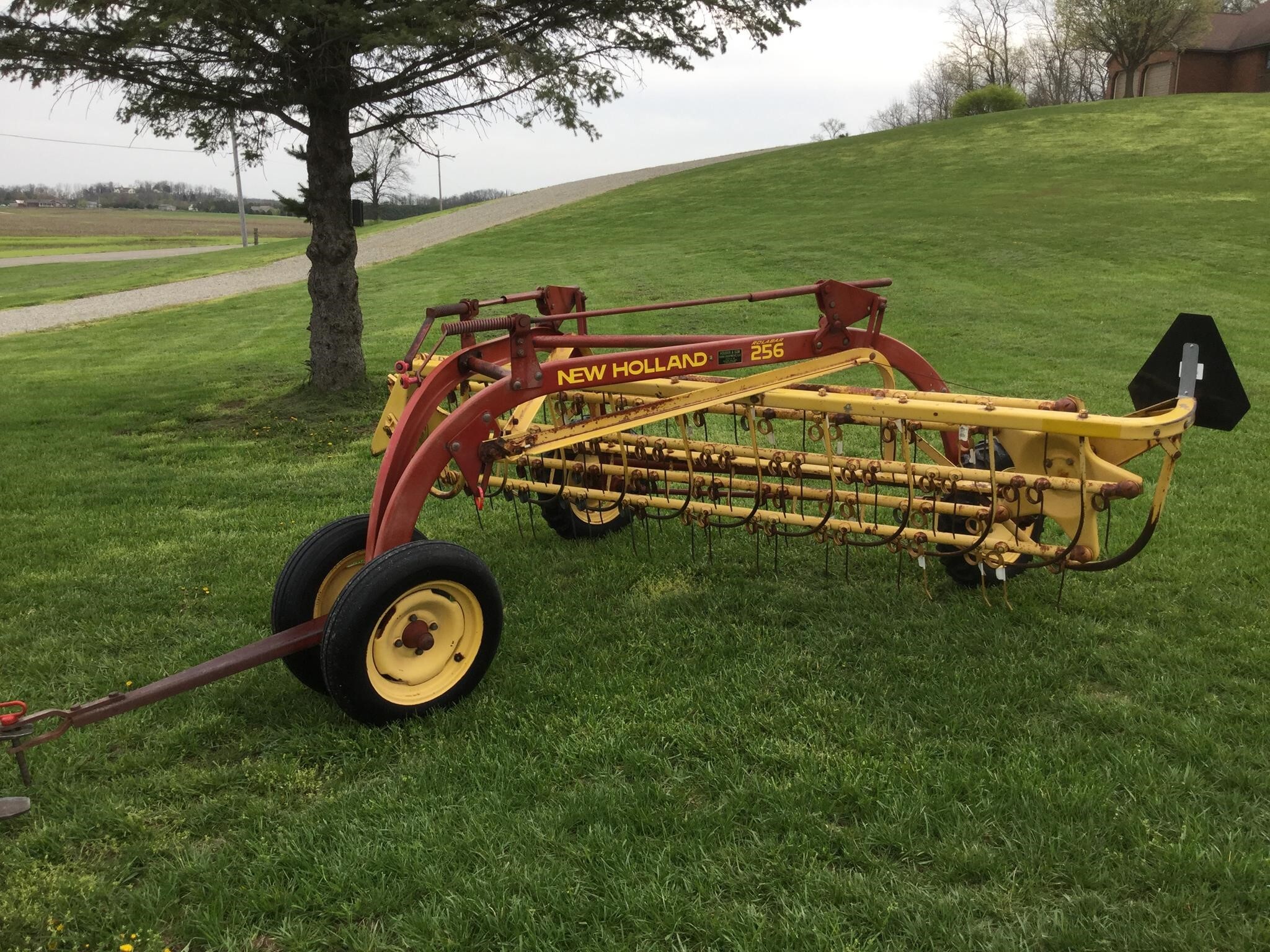 New Holland Rolabar 256 Rake - $3,950 | Machinery Pete