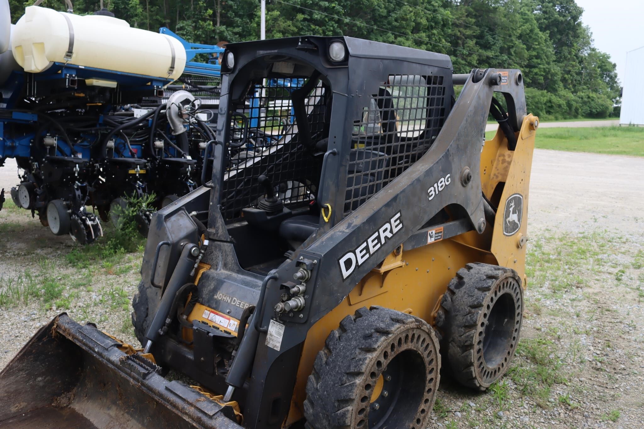 2023 Deere 318G Skid Steer