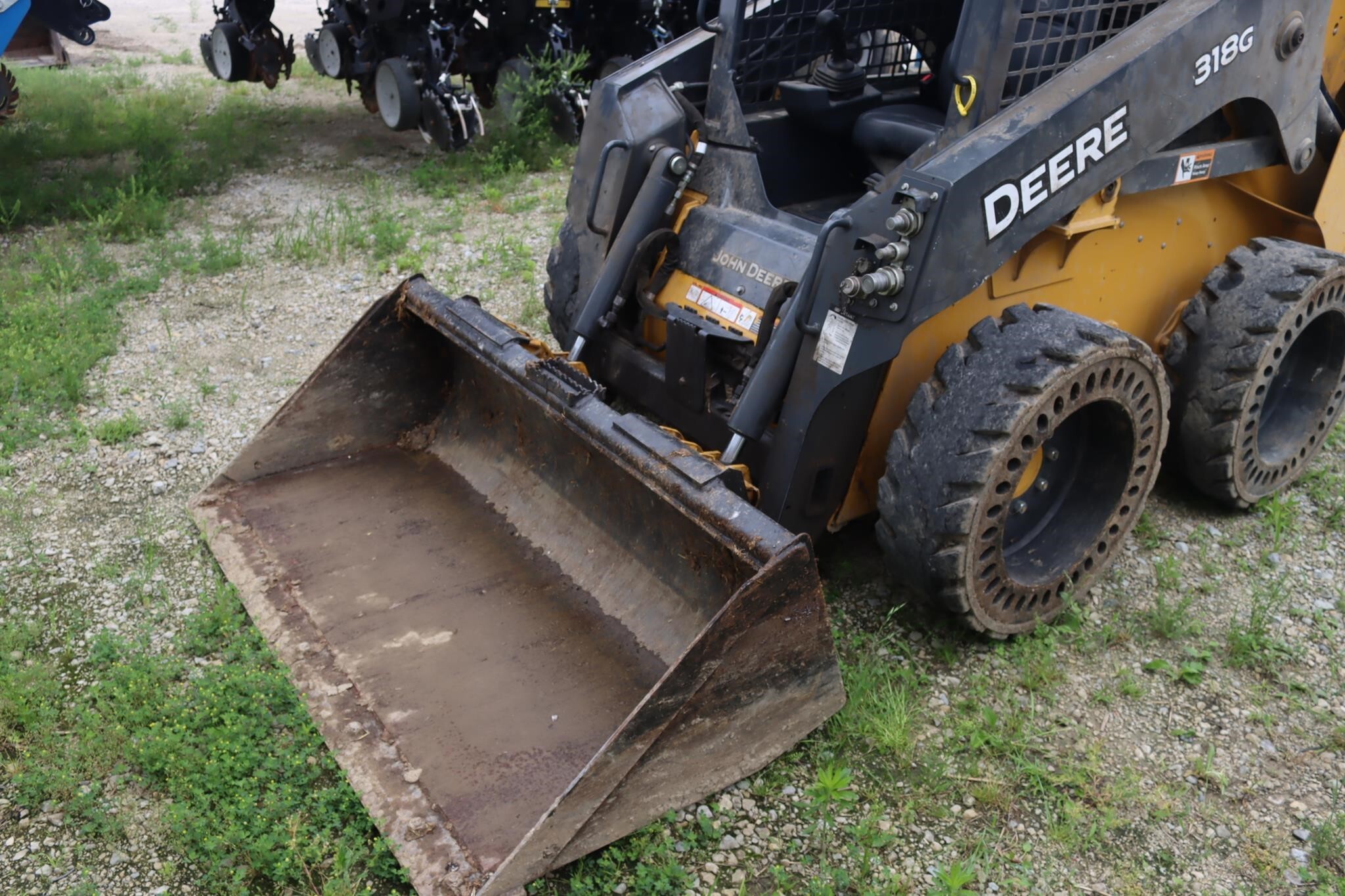 2023 Deere 318G Skid Steer