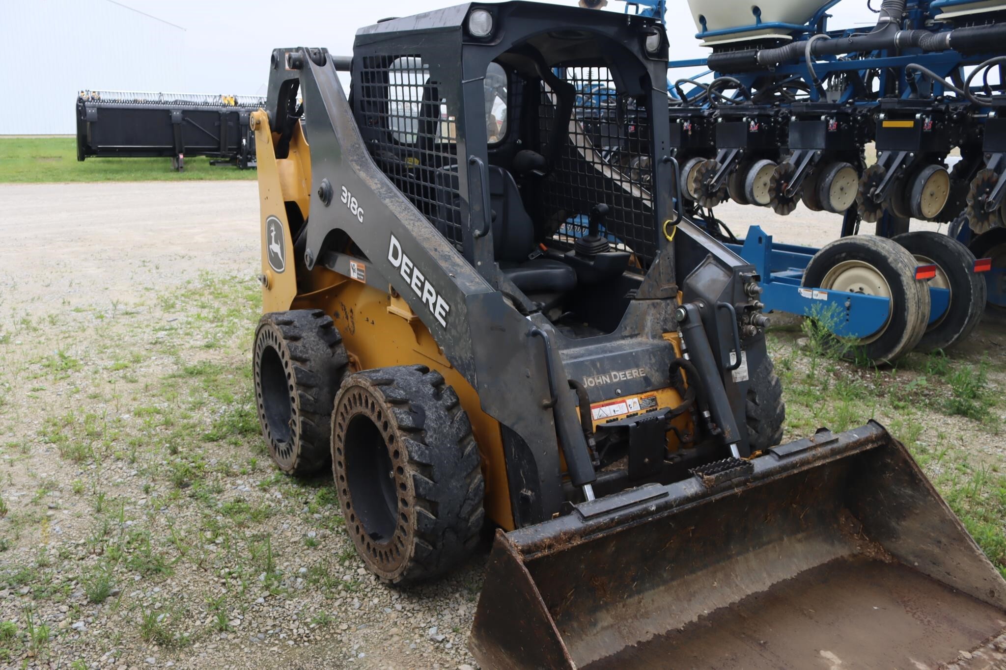 2023 Deere 318G Skid Steer