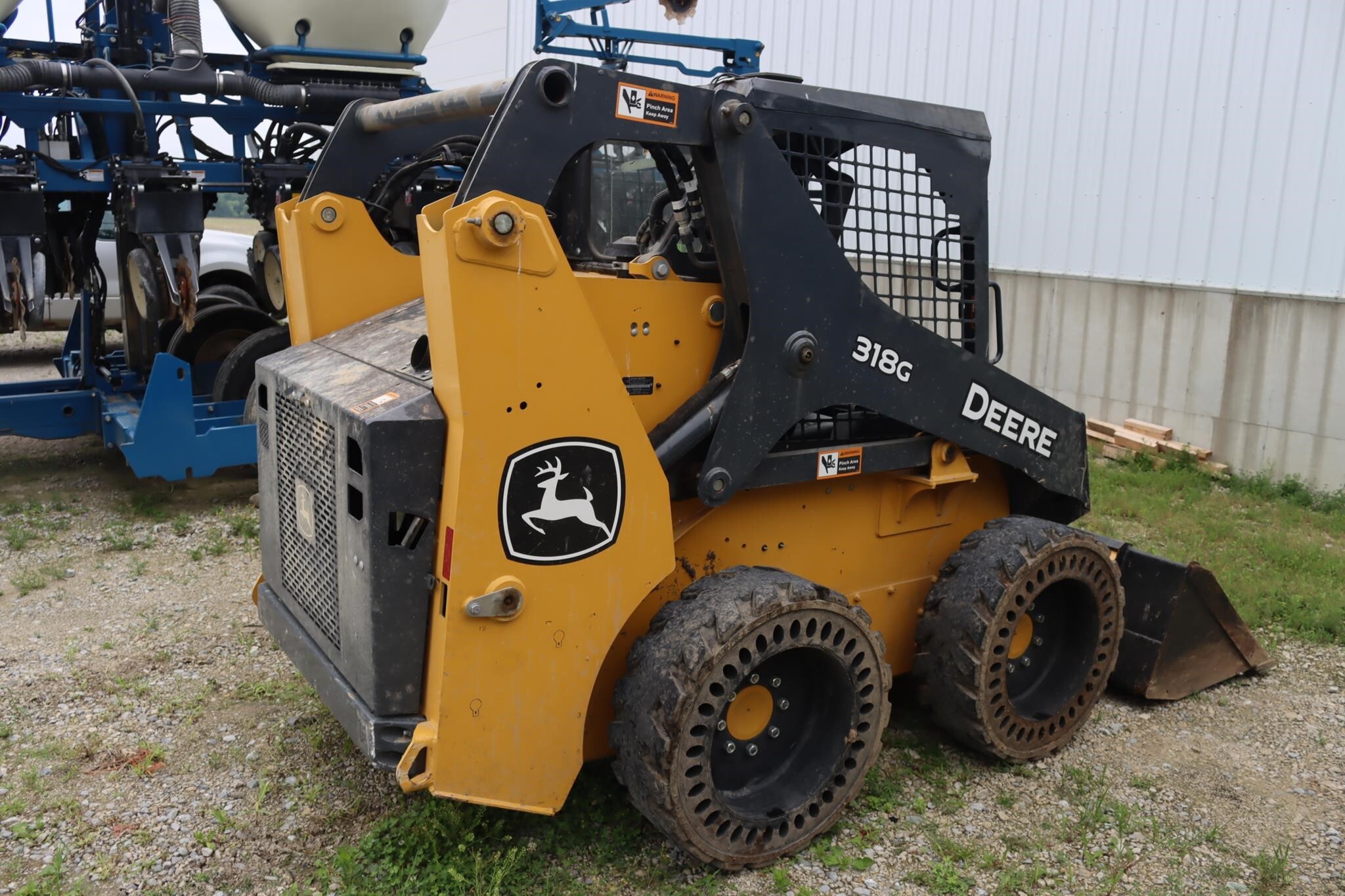 2023 Deere 318G Skid Steer