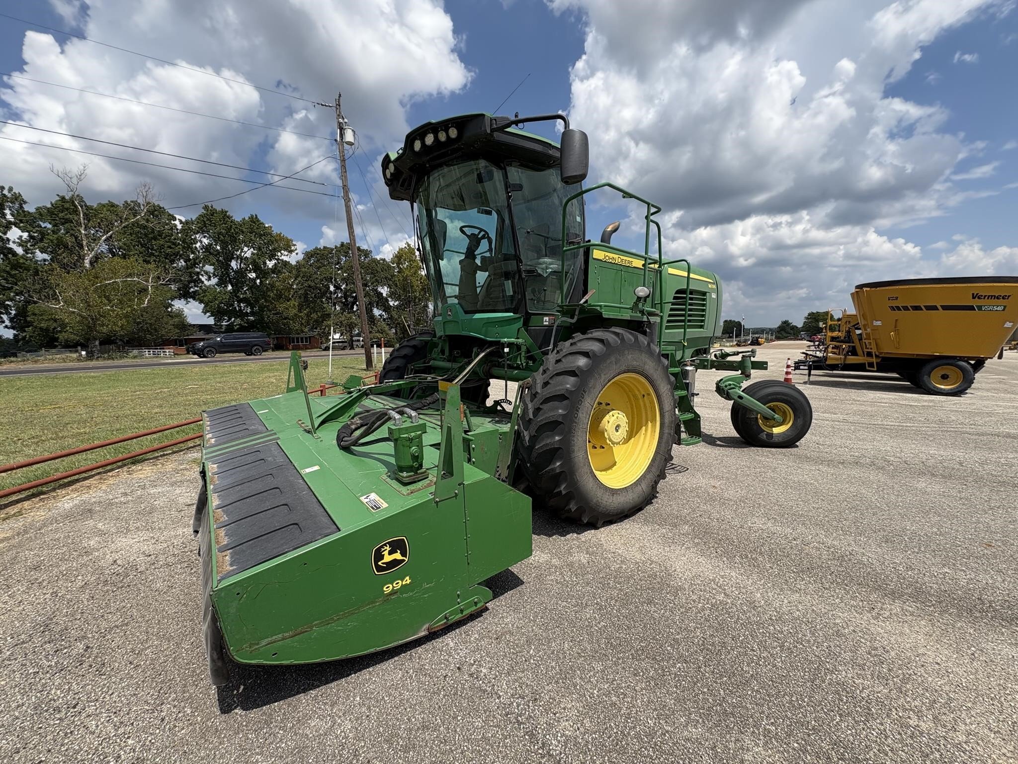  John Deere W235 Self-Propelled Windrowers and Swather