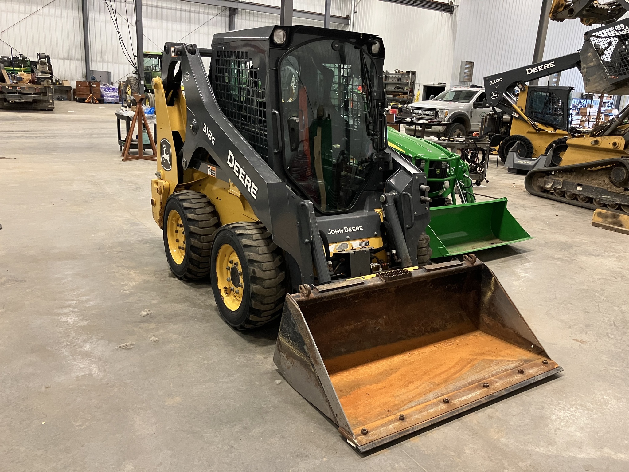 2022 Deere 318G Skid Steer