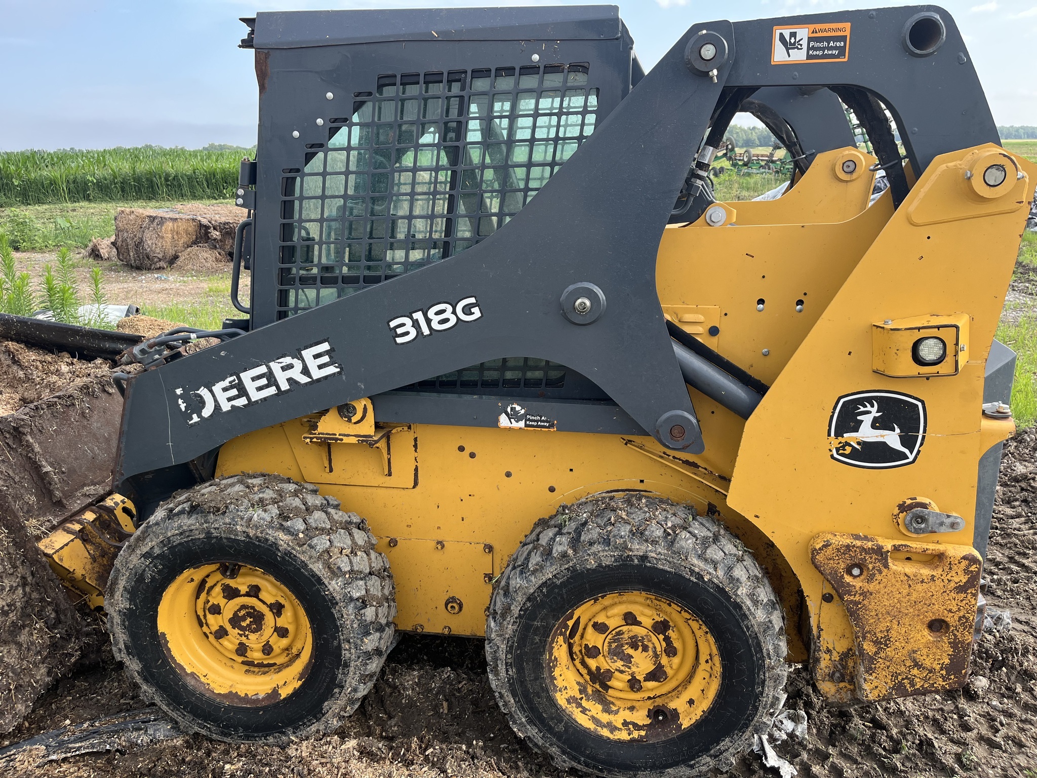 2018 Deere 318G Skid Steer