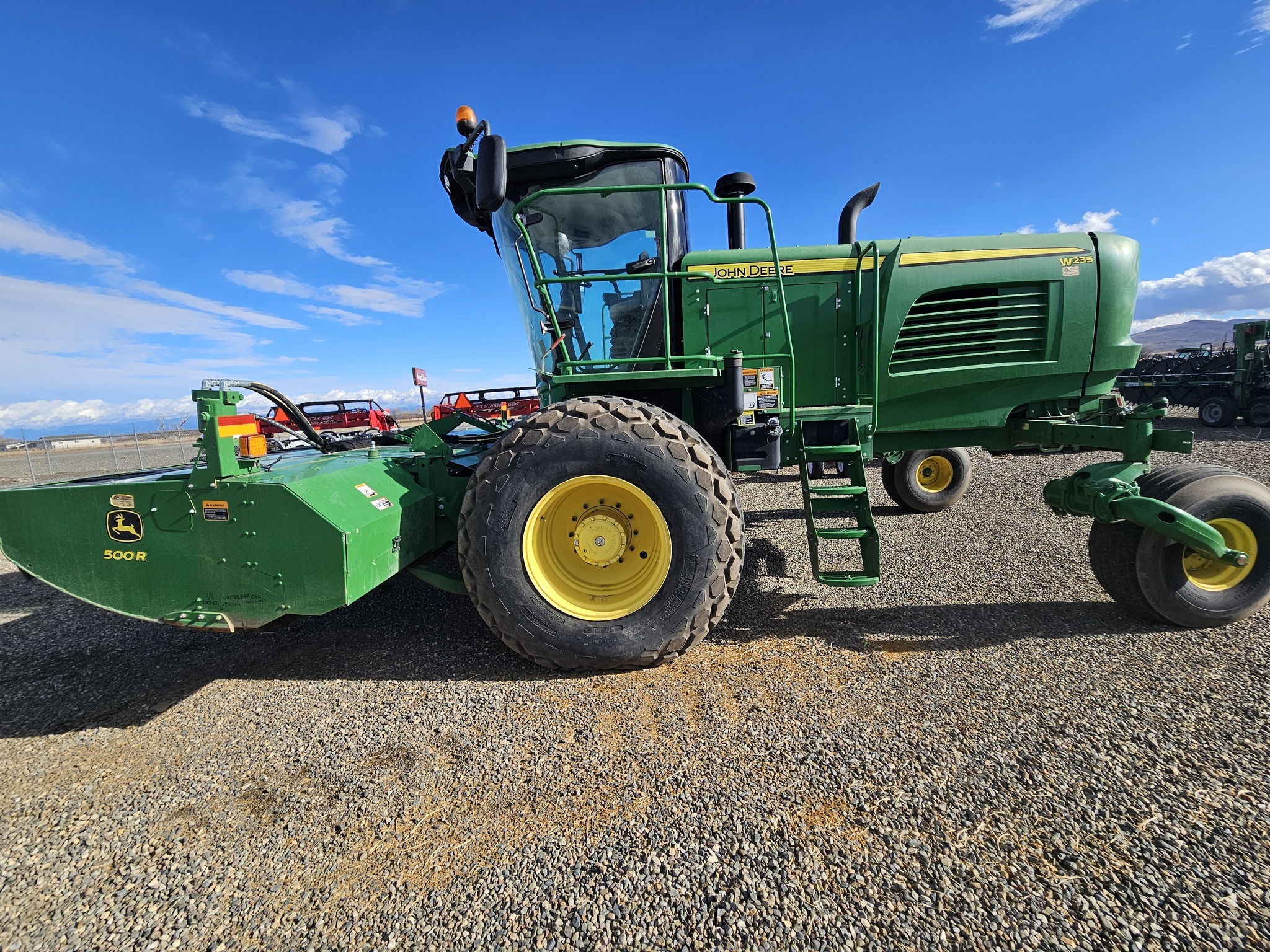 2015 John Deere W235 Self-Propelled Windrowers and Swather