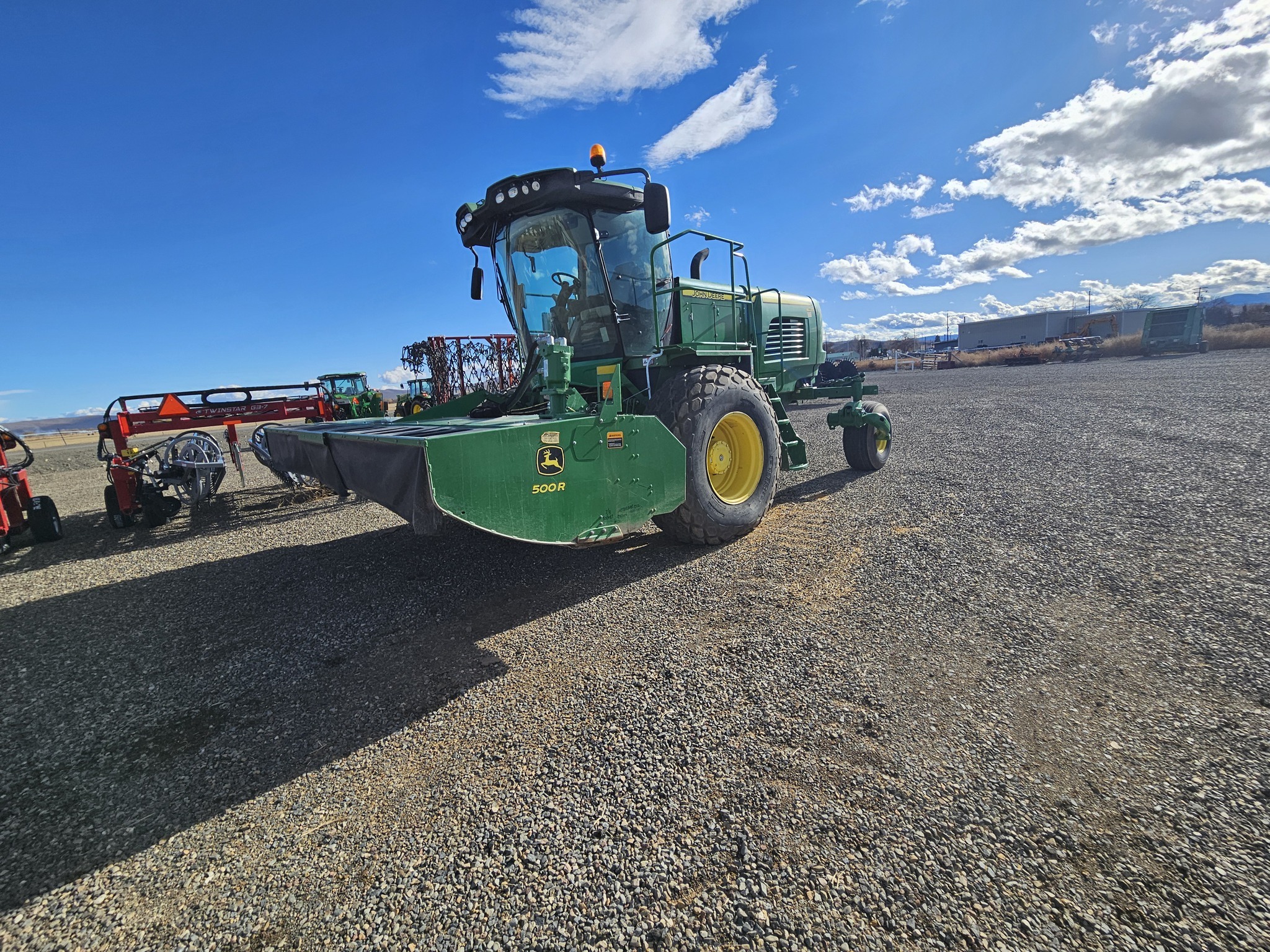 2015 John Deere W235 Self-Propelled Windrowers and Swather