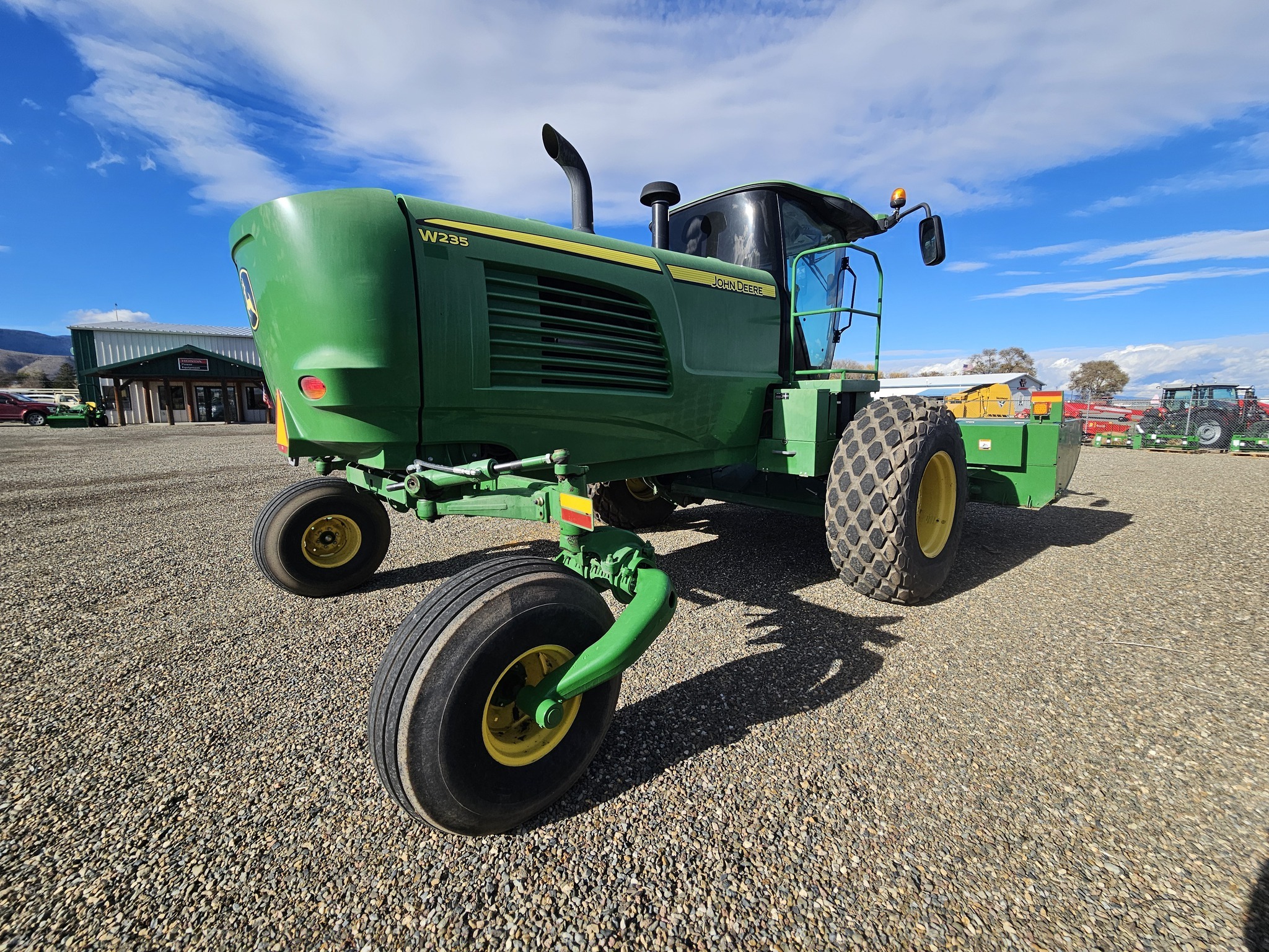 2015 John Deere W235 Self-Propelled Windrowers and Swather