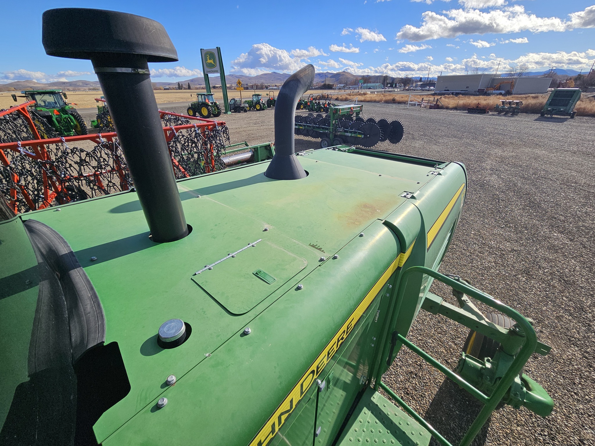 2015 John Deere W235 Self-Propelled Windrowers and Swather