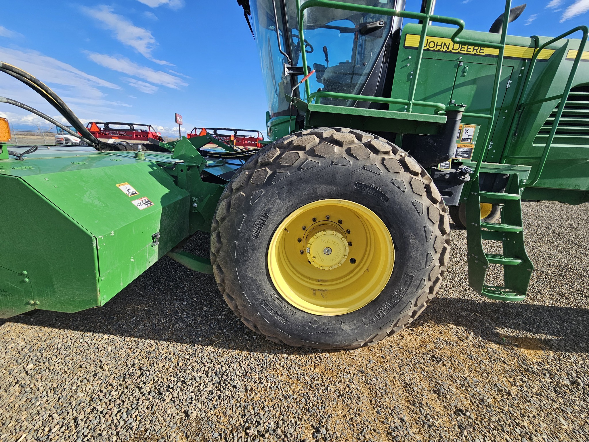 2015 John Deere W235 Self-Propelled Windrowers and Swather