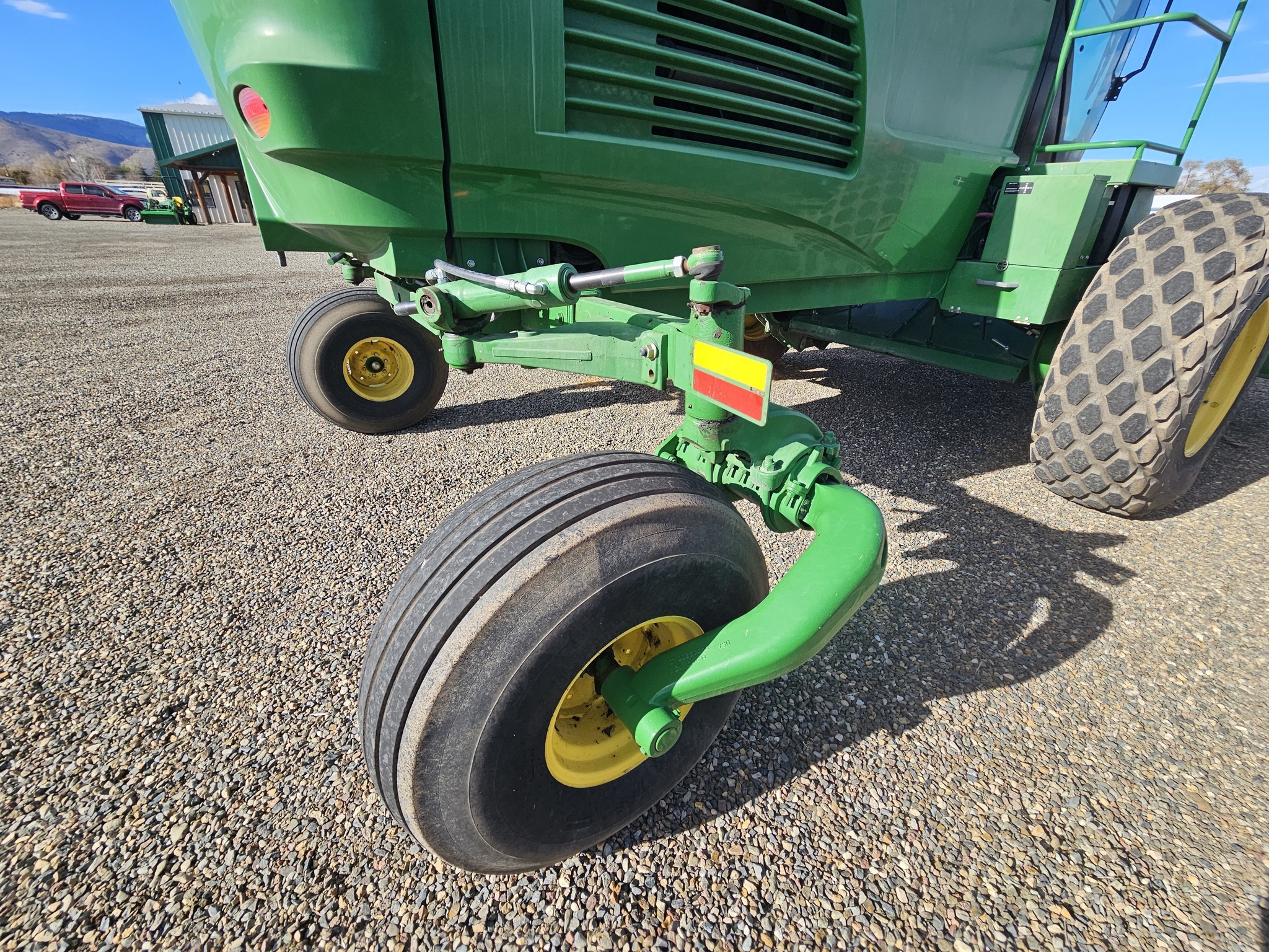 2015 John Deere W235 Self-Propelled Windrowers and Swather
