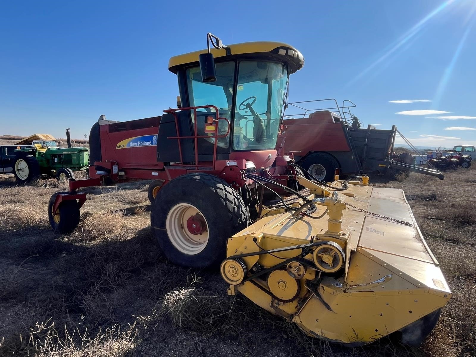 2009 New Holland H8060 Self-Propelled Windrowers and Swather