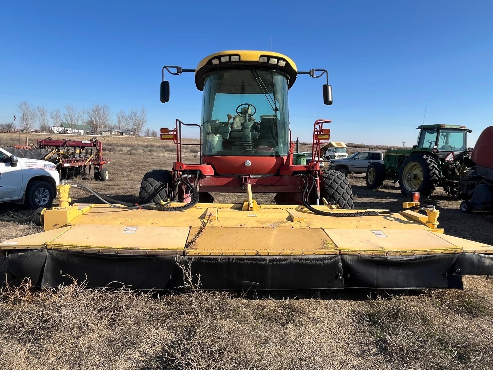 2009 New Holland H8060 Self-Propelled Windrowers and Swather