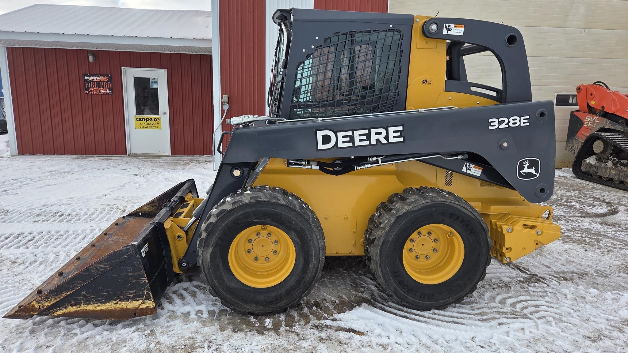 2015 Deere 328E Skid Steer