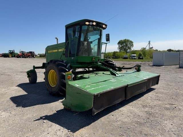  John Deere 4995 Self-Propelled Windrowers and Swather