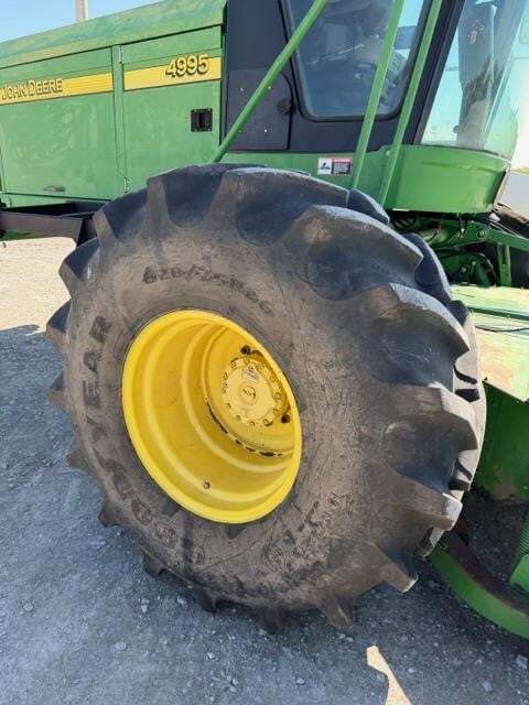  John Deere 4995 Self-Propelled Windrowers and Swather