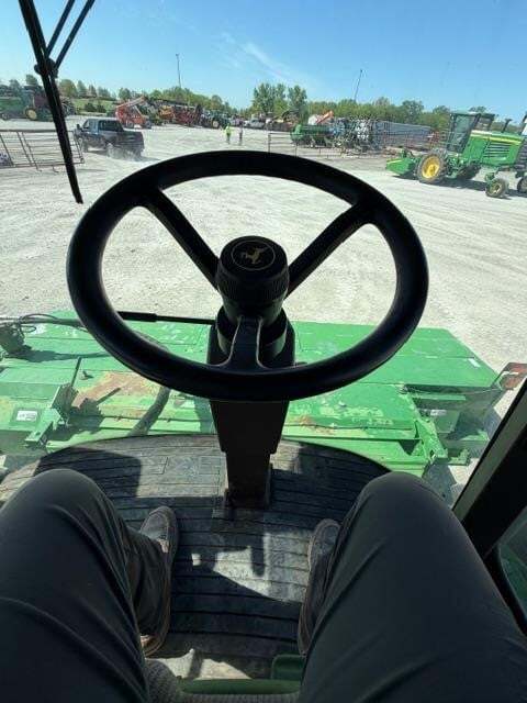  John Deere 4995 Self-Propelled Windrowers and Swather