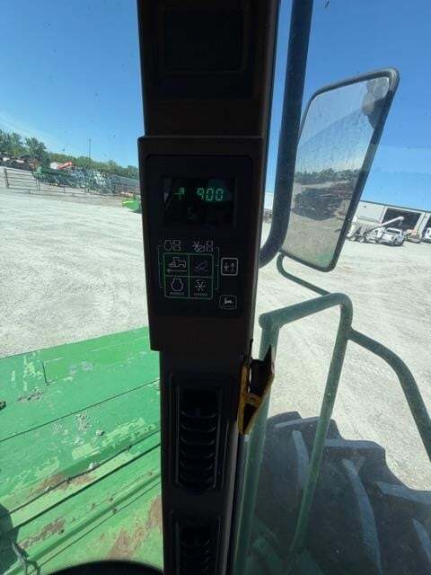  John Deere 4995 Self-Propelled Windrowers and Swather