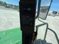  John Deere 4995 Self-Propelled Windrowers and Swather