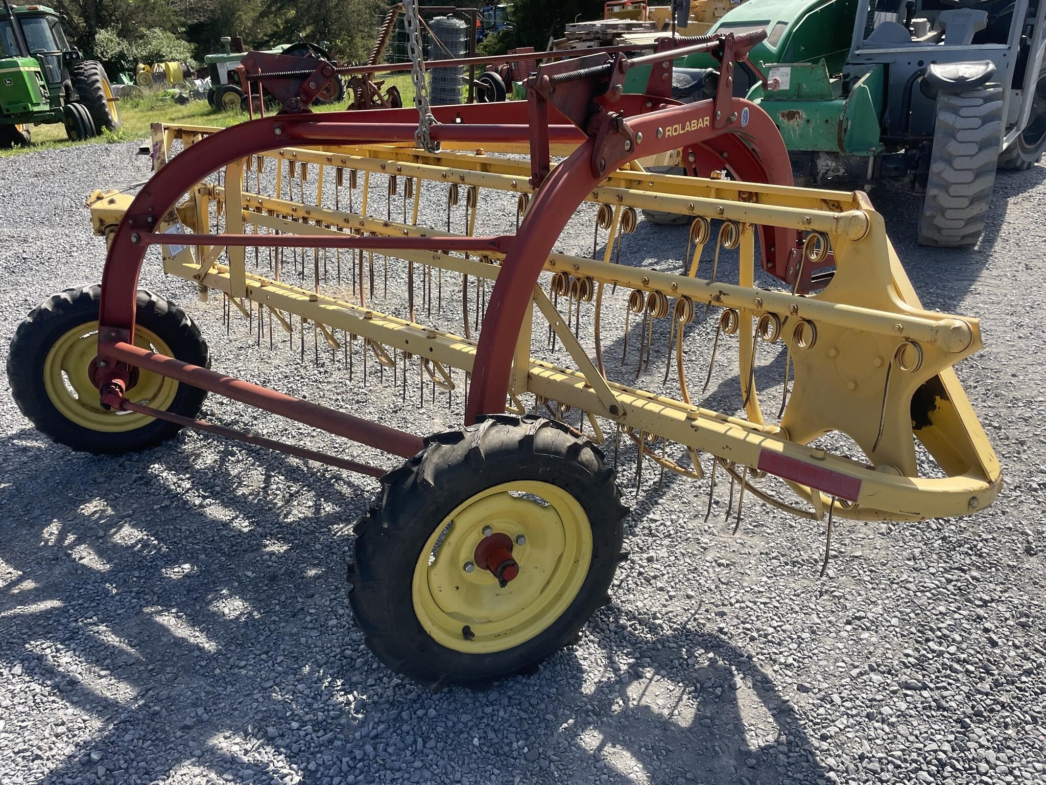 New Holland Rolabar 256 Rake - $2,495 | Machinery Pete