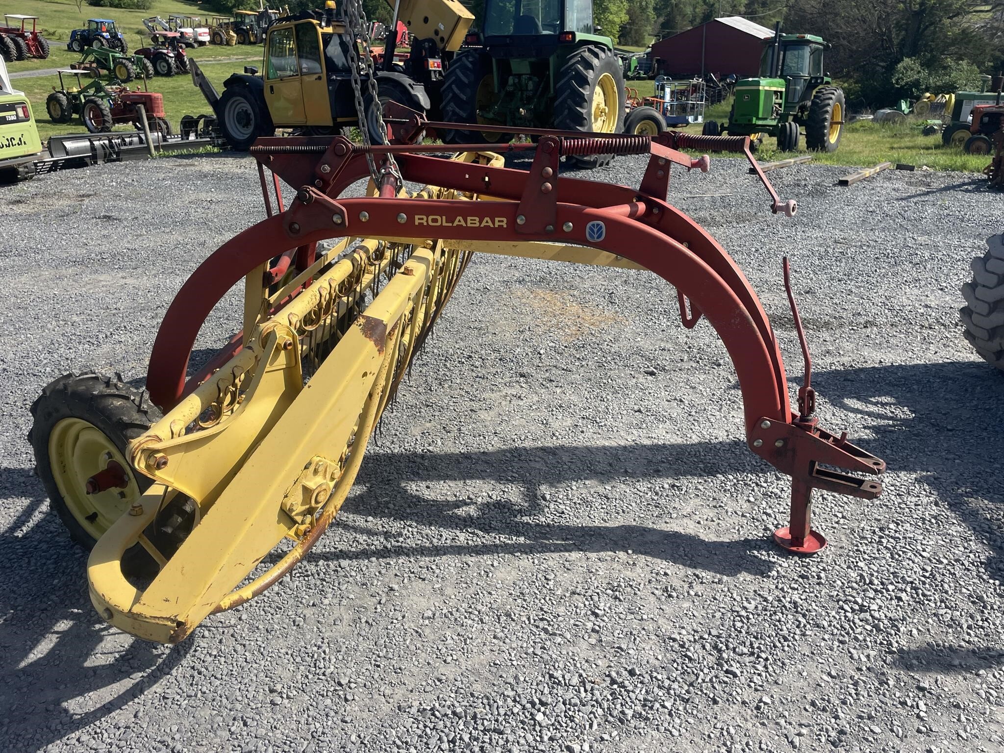 New Holland Rolabar 256 Rake - $2,495 | Machinery Pete