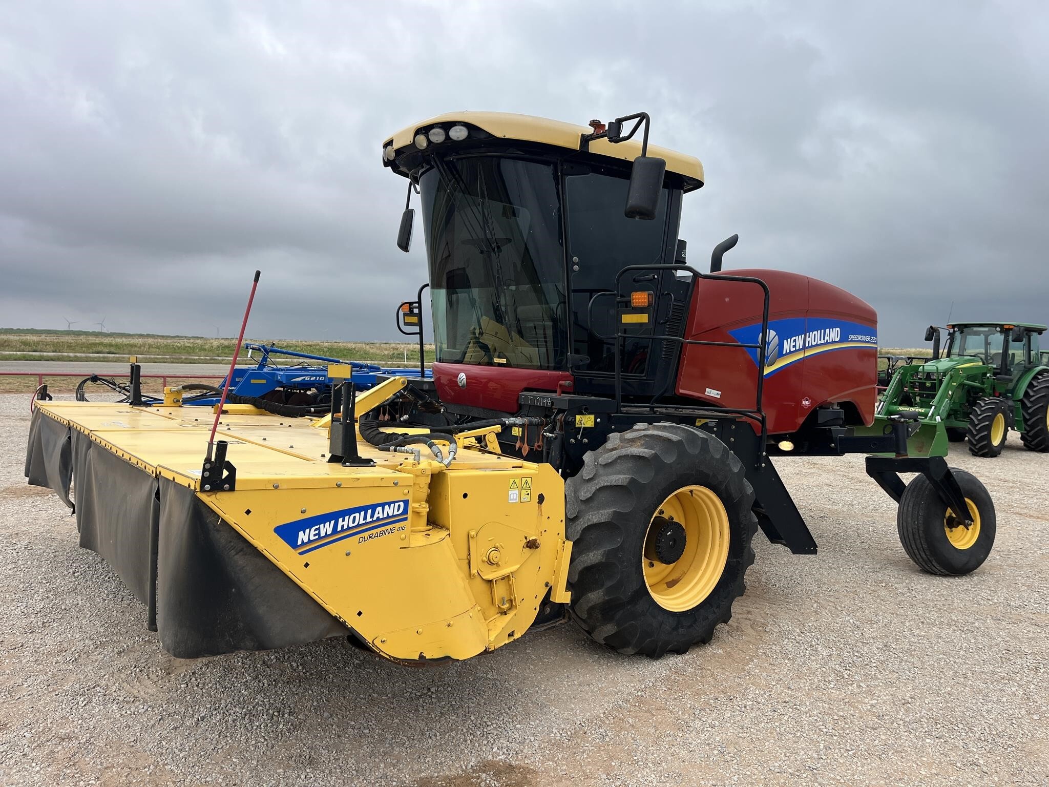2019 New Holland Speedrower 220 Self-Propelled Windrowers and Swather