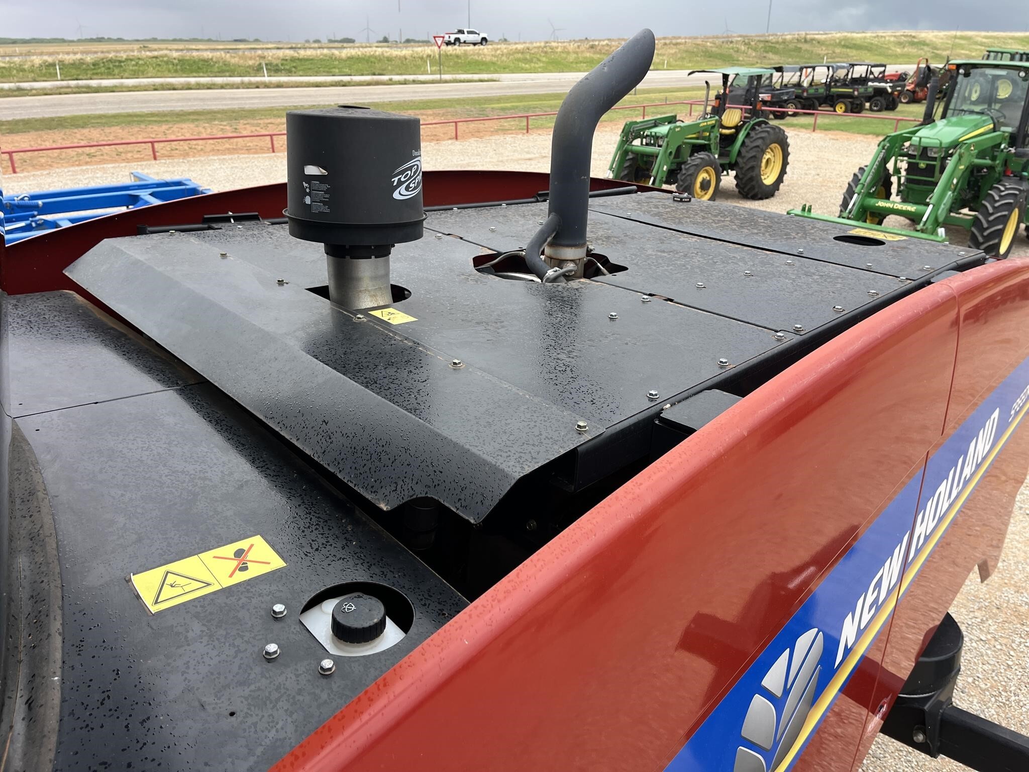 2019 New Holland Speedrower 220 Self-Propelled Windrowers and Swather