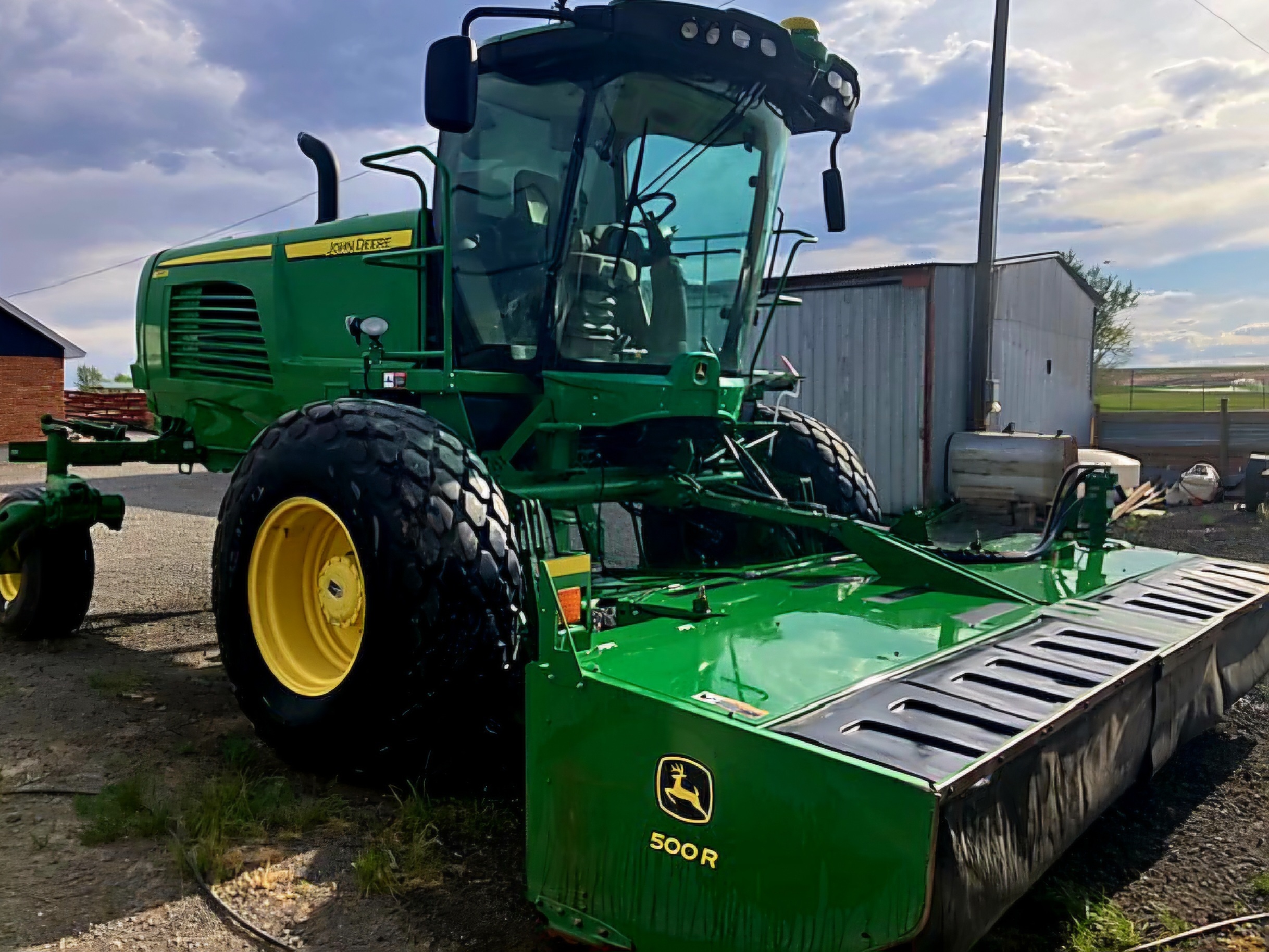 2016 John Deere W235 Self-Propelled Windrowers and Swather