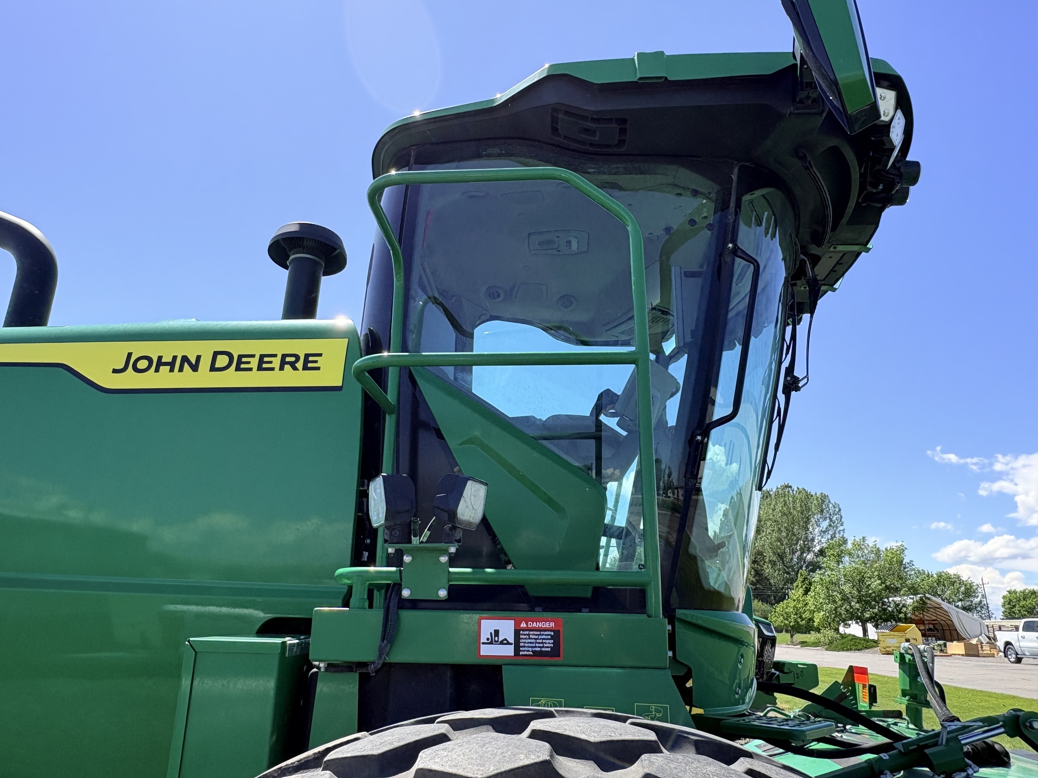 2023 John Deere W235R Self-Propelled Windrowers and Swather