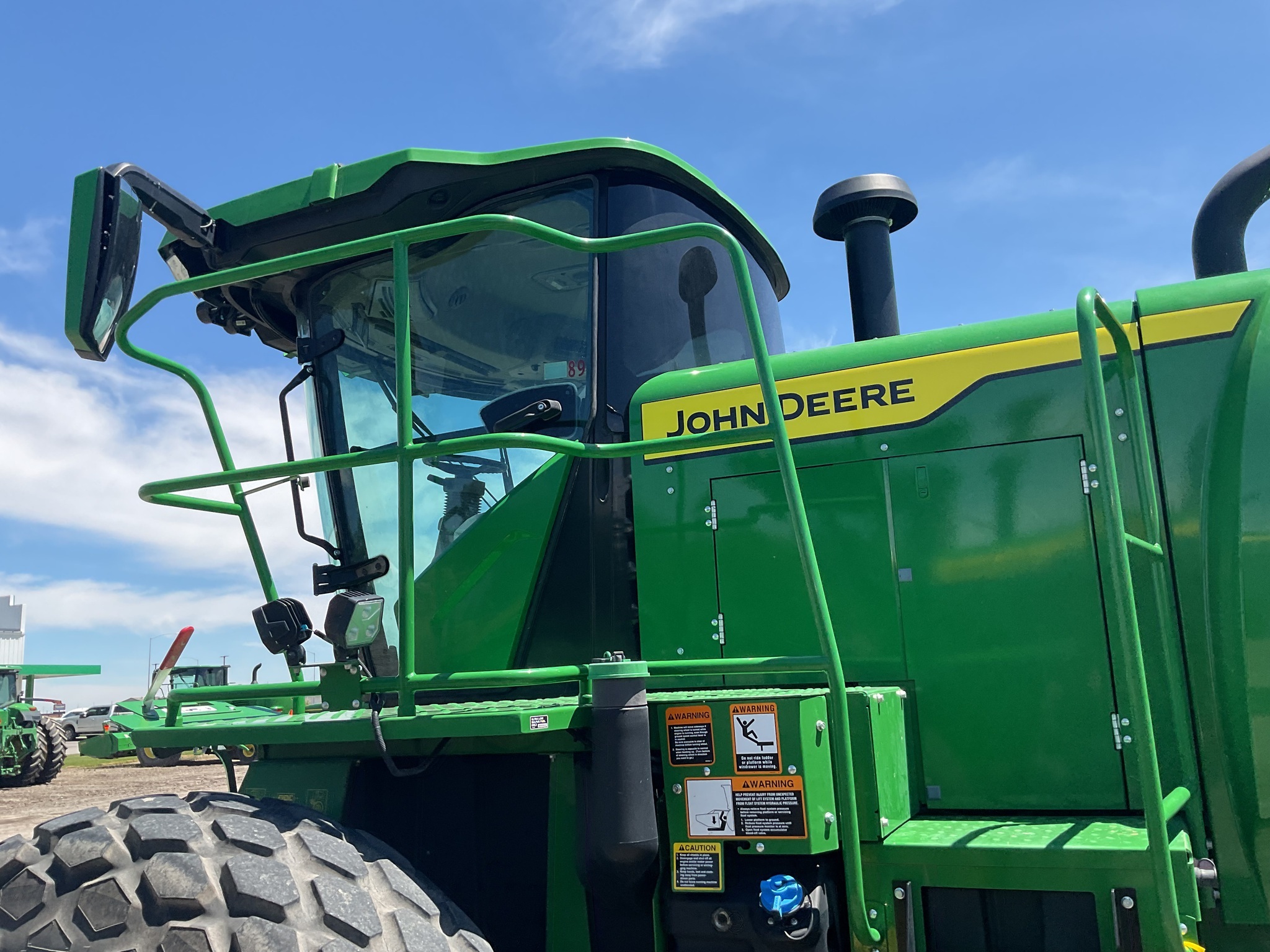 2023 John Deere W235R Self-Propelled Windrowers and Swather