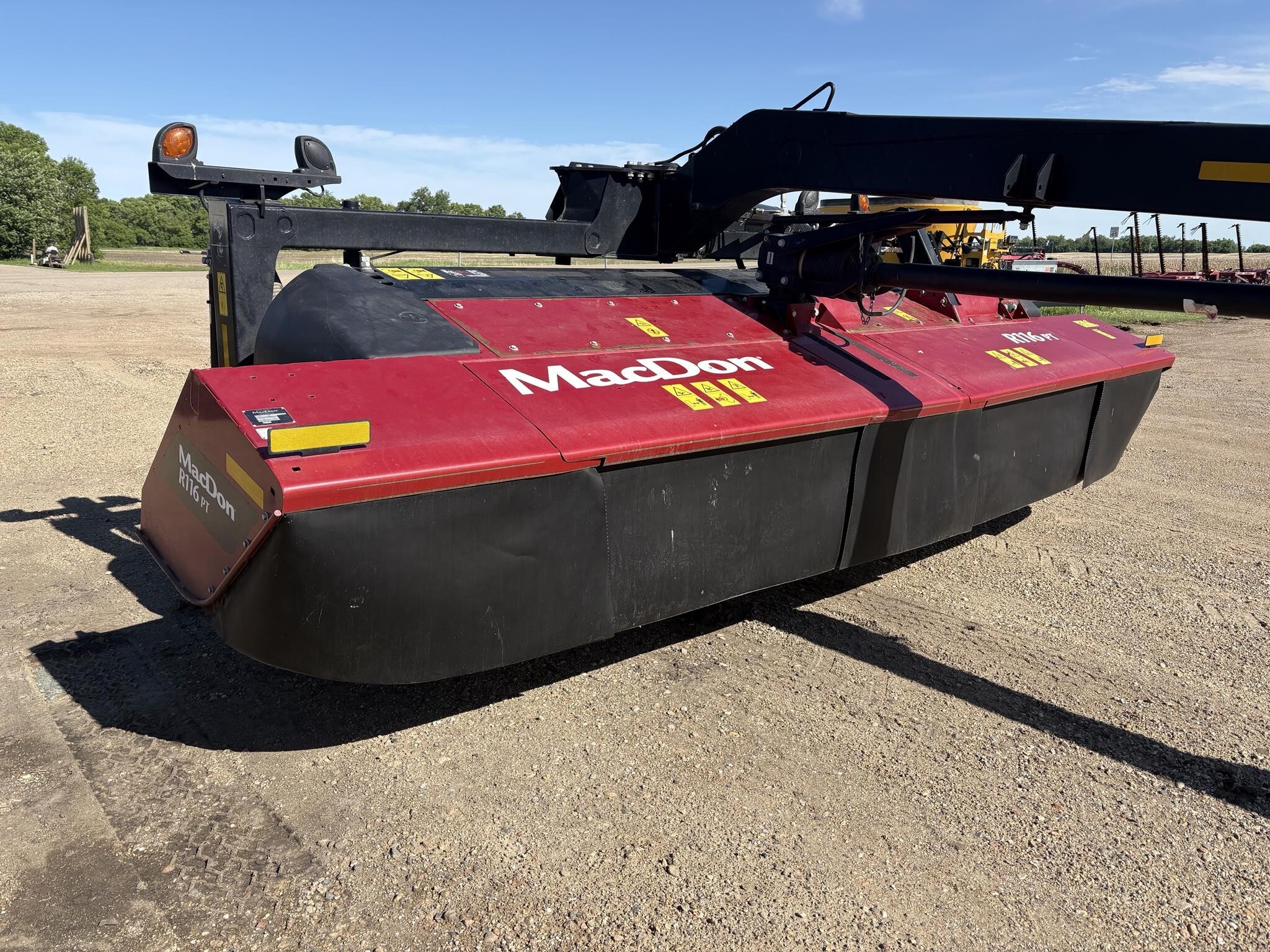 2021 MacDon R116PT Pull-Type Windrowers and Swather