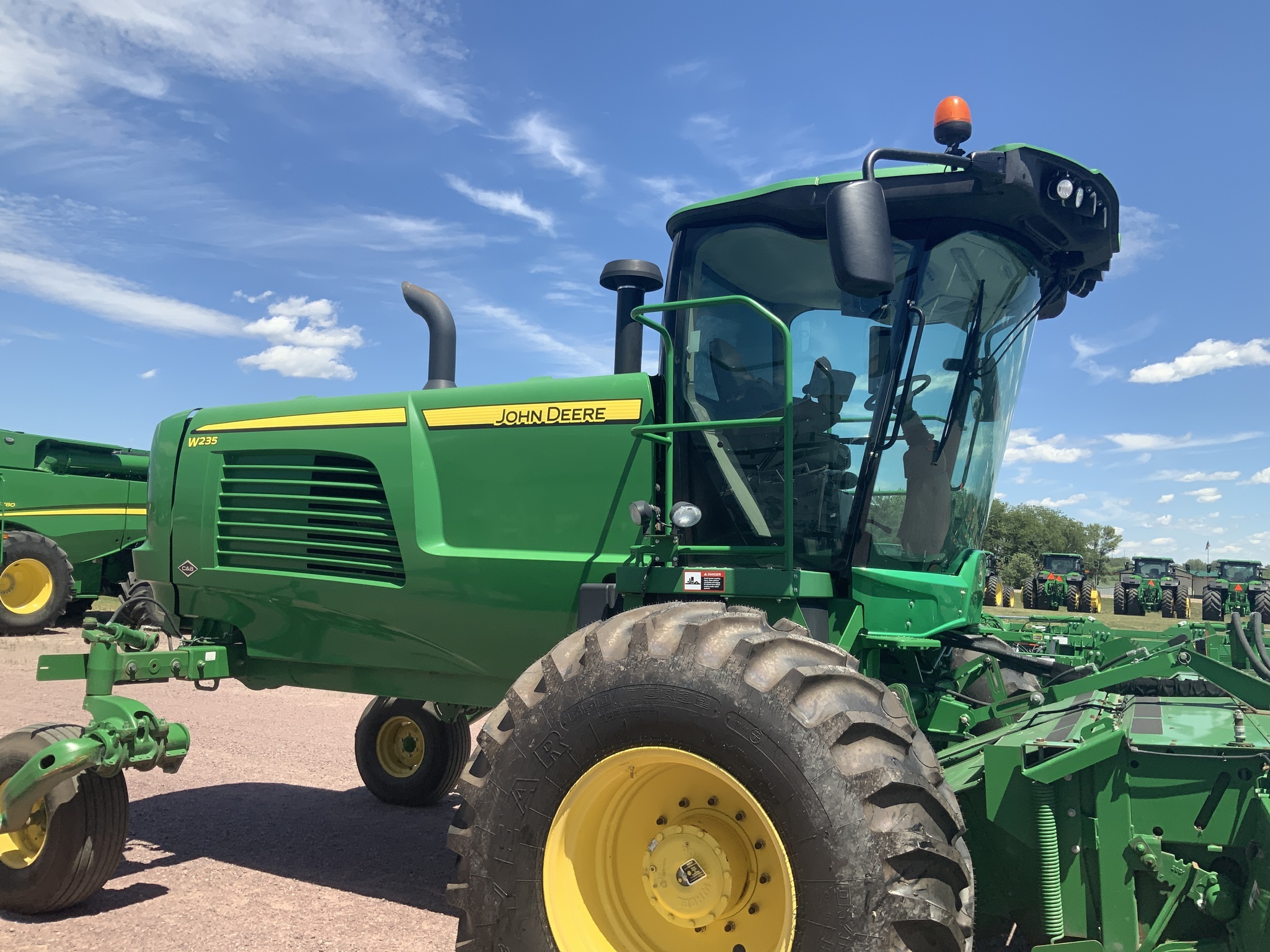 2014 John Deere W235 Self-Propelled Windrowers and Swather