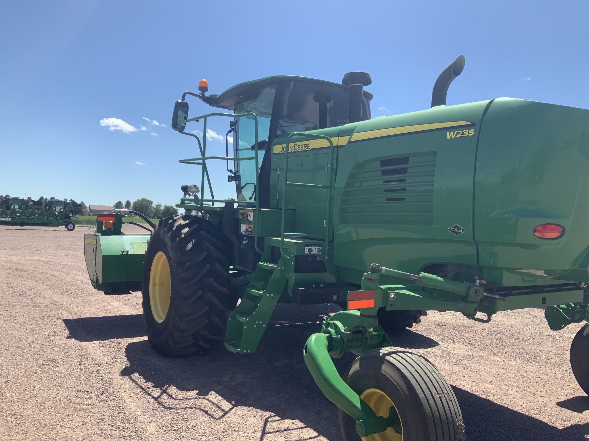 2014 John Deere W235 Self-Propelled Windrowers and Swather