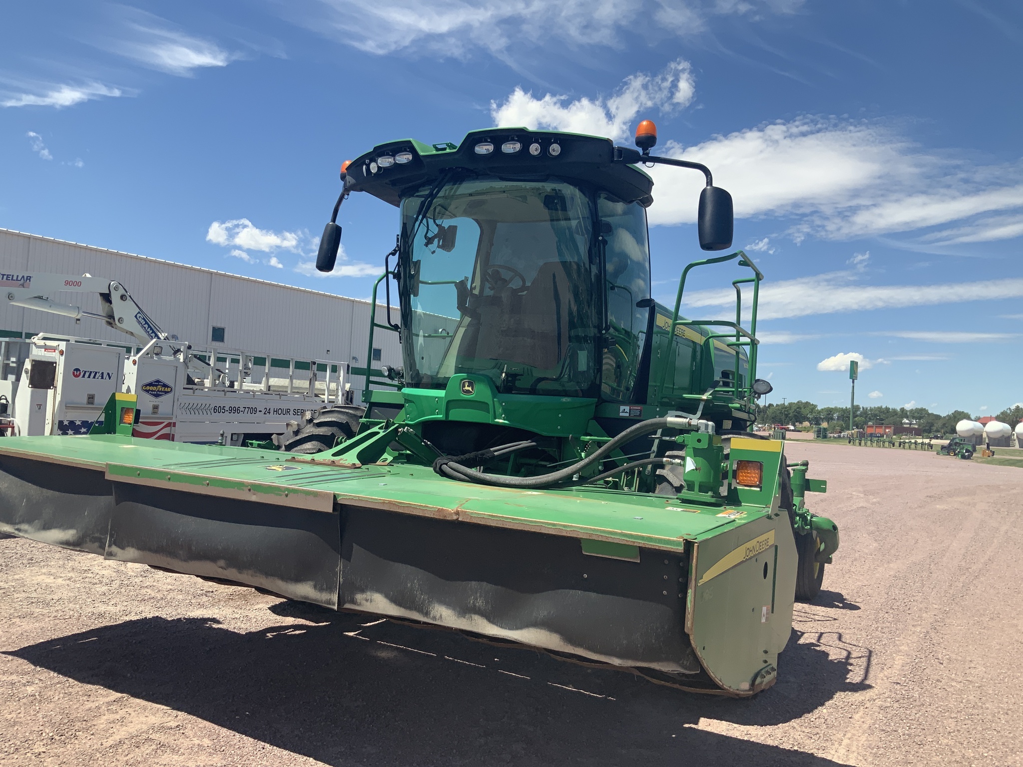 2014 John Deere W235 Self-Propelled Windrowers and Swather