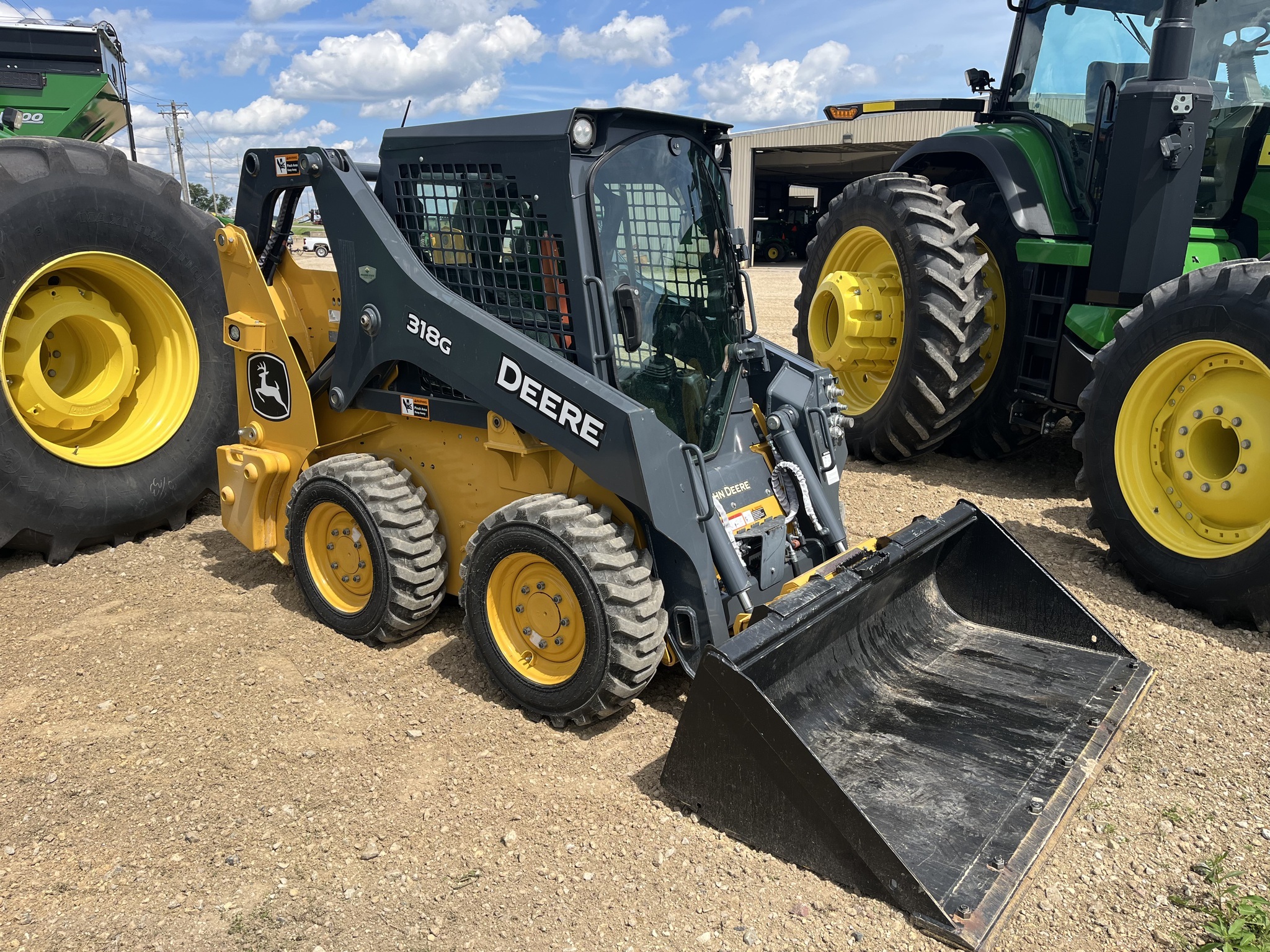 2023 Deere 318G Skid Steer