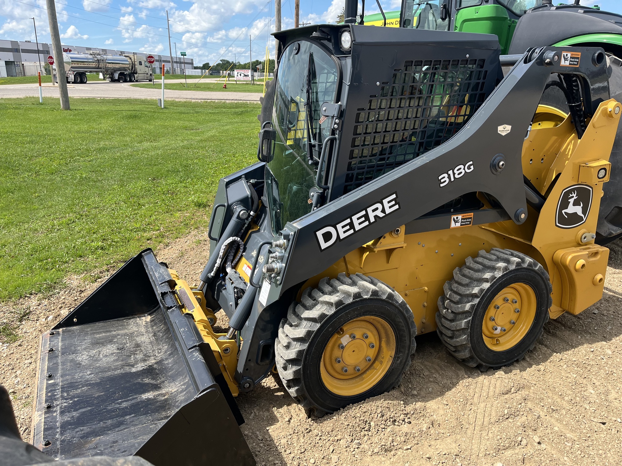 2023 Deere 318G Skid Steer
