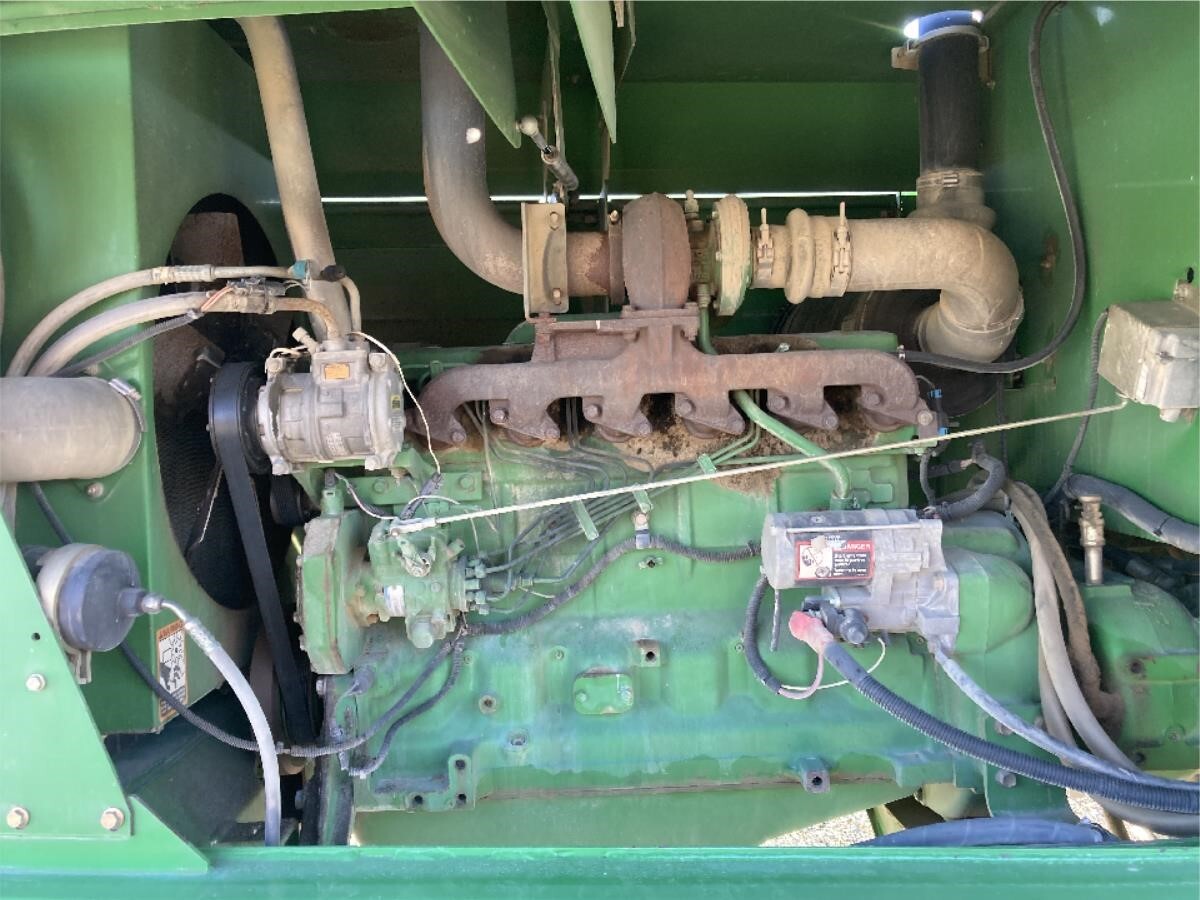 2005 John Deere 4995 Self-Propelled Windrowers and Swather