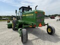  John Deere 4995 Self-Propelled Windrowers and Swather