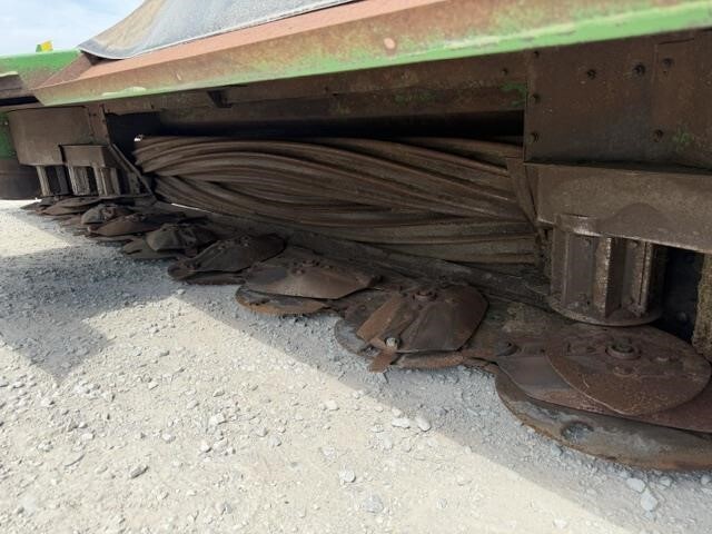  John Deere 4995 Self-Propelled Windrowers and Swather