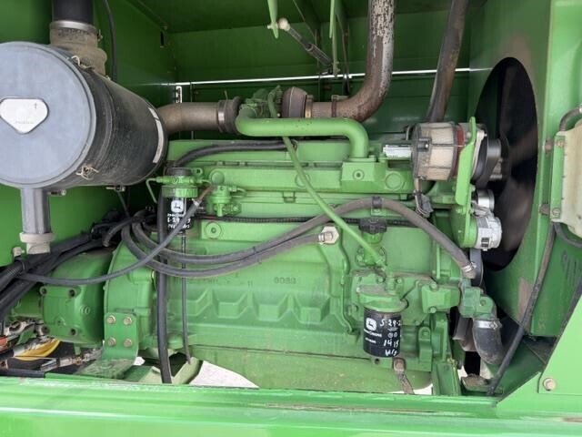  John Deere 4995 Self-Propelled Windrowers and Swather