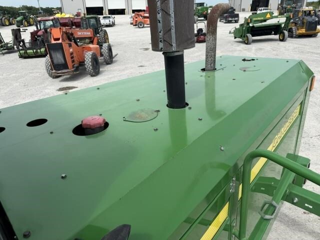  John Deere 4995 Self-Propelled Windrowers and Swather