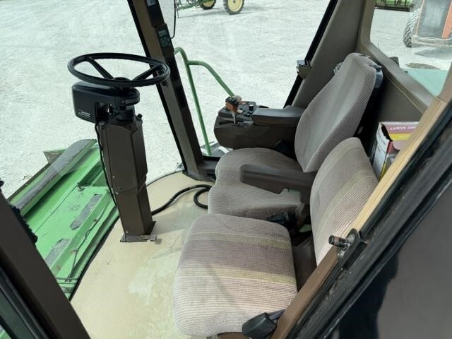  John Deere 4995 Self-Propelled Windrowers and Swather