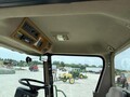  John Deere 4995 Self-Propelled Windrowers and Swather